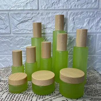 флакон с лосион от матово зелено стъкло обем 100 мл с капак на дървена козметични контейнер Празен флакон с прес-шум Стъклена опаковка за флакон